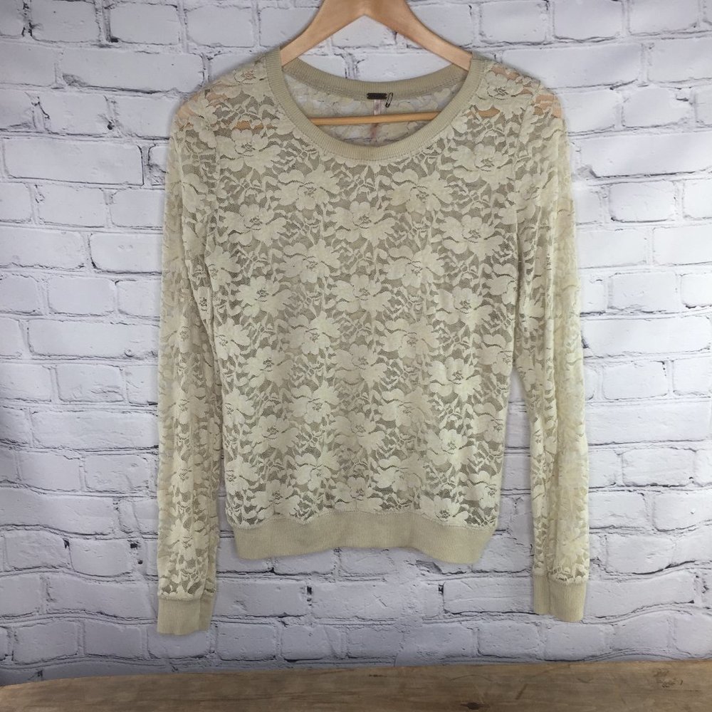 Large Poof! Lace long sleeved sheer top. EUC. Selling a black one also.